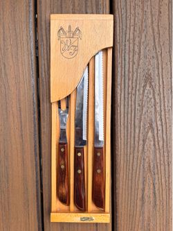 3 piece vintage carving set in a wall hanger