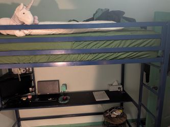 blue metal twin loft bed with desk