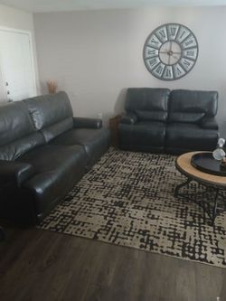 Leather sofa set .. moving no longer need