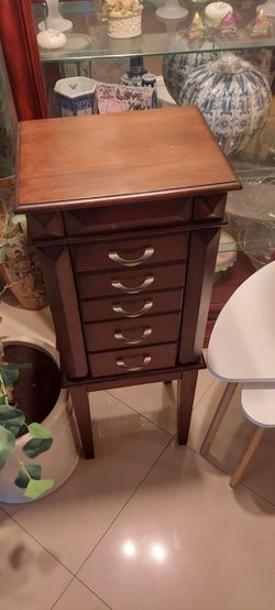 Wooden freestanding jewelry armoire with five drawers $70