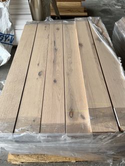 I have Engineered Hardwood flooring $.60 cents a square foot HMU!
