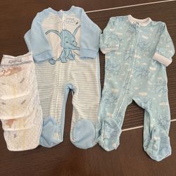 Two DISNEY footies with four Huggies Diapers(size2), 3 mo