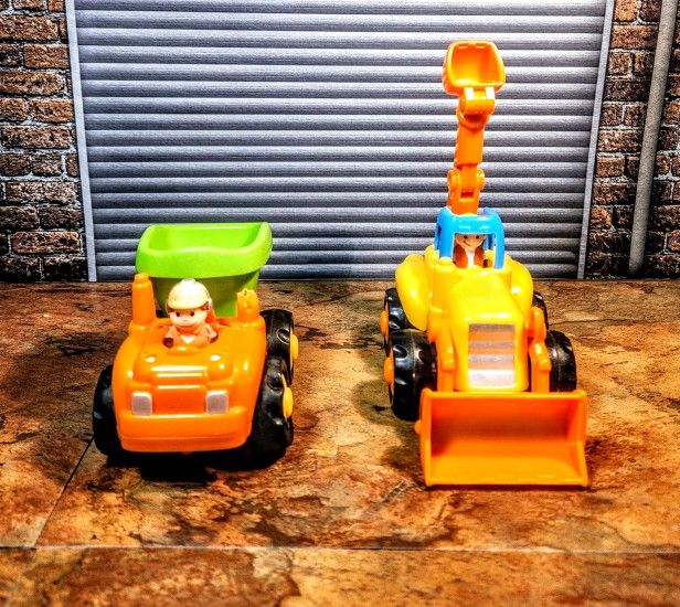 2- Lot Huile Trucks • Both Friction Powered , Push & Go • 1 - Bull Dozer & 1-Dump • Both Have Movable Parts •
