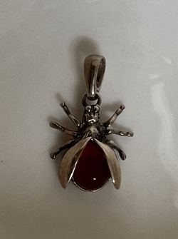 Vintage Sterling silver and a cognac-colored Baltic deep Red amber stone insect pendant