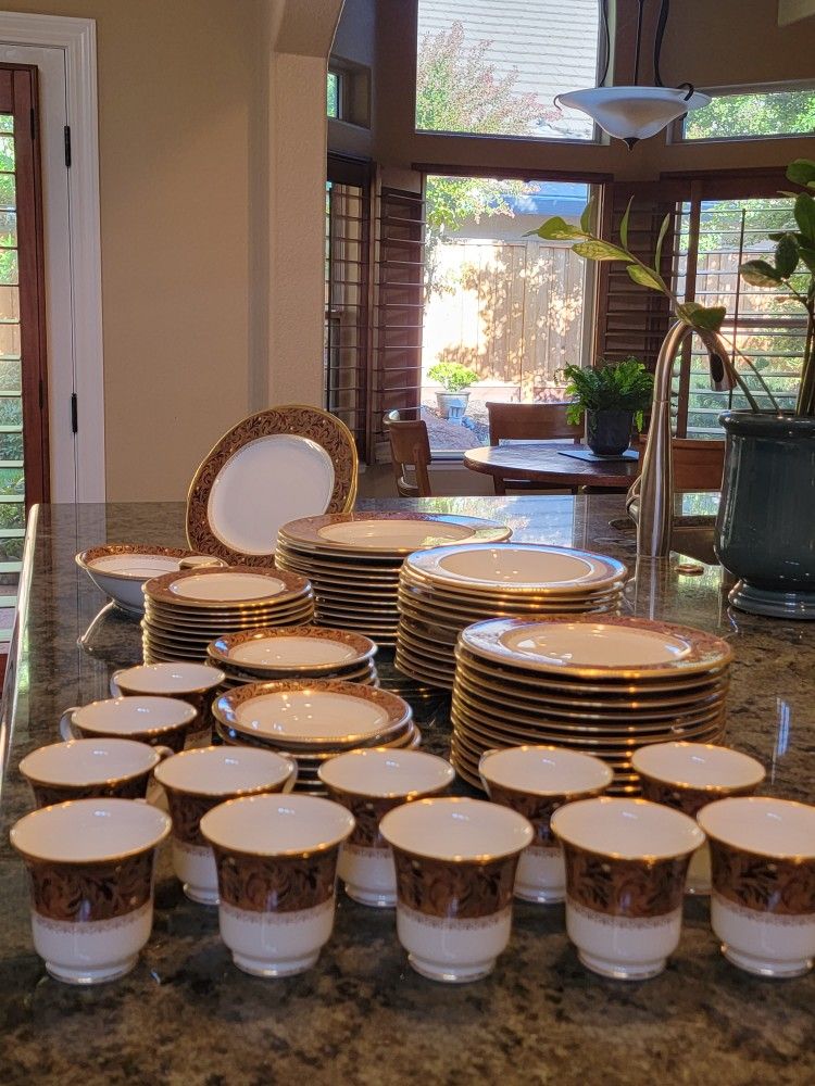 Noritake Bone China Xavier 76pc Gold Service for 12 plus Serving dishes, platter & salt & pepper.