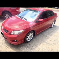 Toyota Corolla 09 And Mini Cooper 