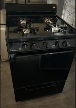 Small 24" Gas Stove -electric Ignition .