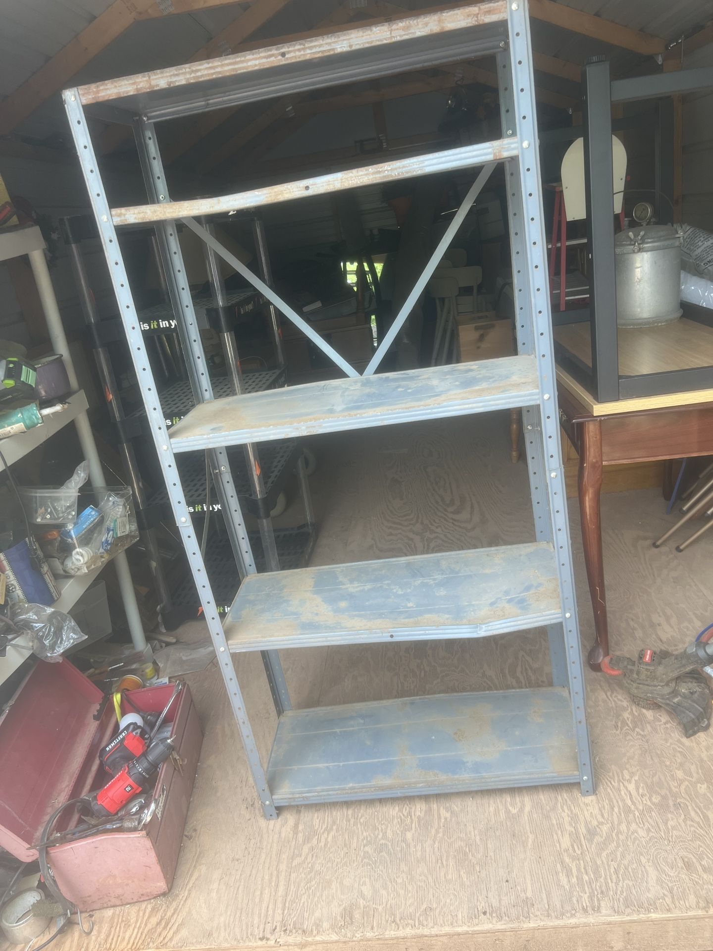 Old metal shelf it’s 62 inches tall 30 inches wide and 12 inches deep