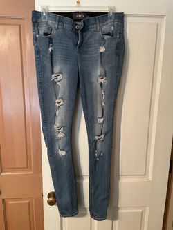 Women’s torrid brand denim, distressed light blue bombshell skinny jeans 16XT