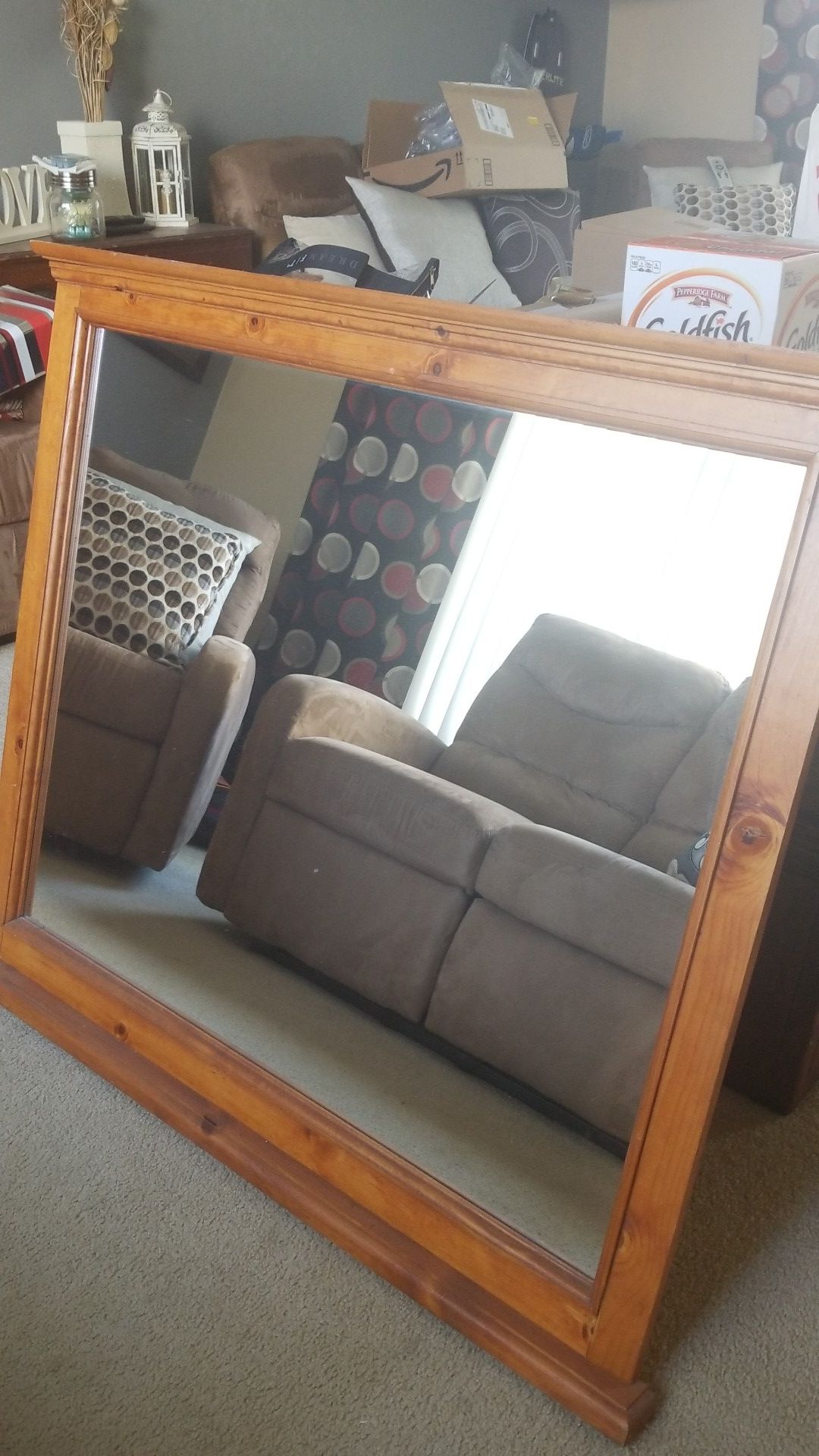 Solid oak framed mirror.