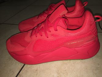 Brand new red pumas size 12 in men