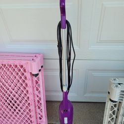 USED ONCE. Bissell Featherweight Stick Lightweight Bagless Vacuum with Crevice Tool, 20334, Purple