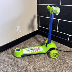 Kids Electric Scooter Green In Box With Pads