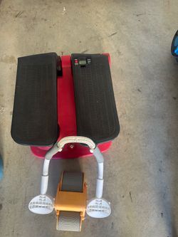PreAsion air stepper climber fitness machine with red and black pedals and portable abdominal wheel roller with elbow supports.