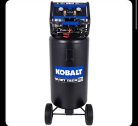 Kobalt Quiet Tech air compressor. 26 Gallon 150 Psi. It has a black vertical tank. It has wheels for easy movement. It has a blue control panel with g