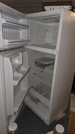 White Fridge. Has a loose wire in freezer