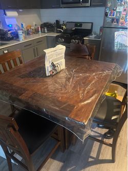 Wooden Table w/ 4 chairs