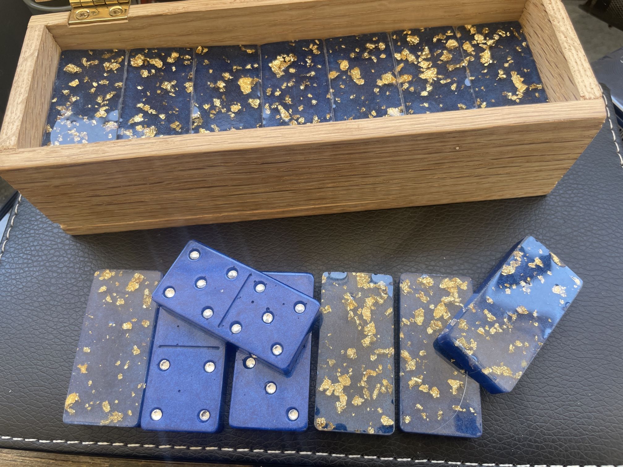 Gold leaf, lazurite, diamond domino set