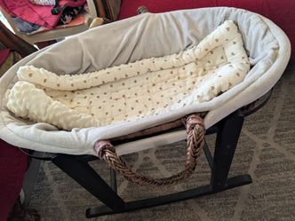 Used rocking moses bassinet