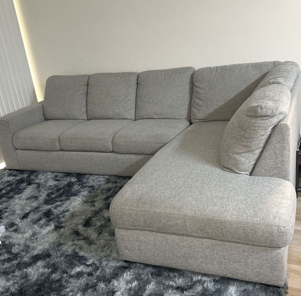 Light Gray Living Spaces L-Shape Sectional Sofa with Rightside Chaise