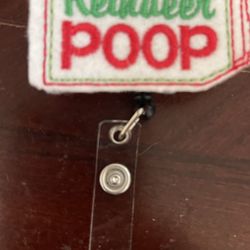 Reindeer Poop Badge Reel