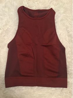 Lululemon Seamless Crop Top — Burgundy/dark red with mesh side panels and racerback. High neck. Lululemon logo on back. Gently used.