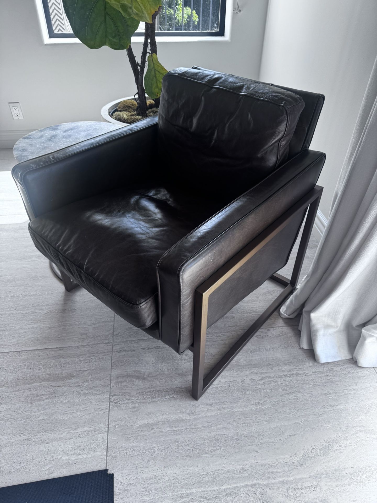 Two Brown Leather Chairs