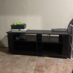 55” and down tv stand Good Condition