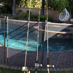 THREE (3) Custom Fishing Rods with Penn Senators & Jigmaster Reels.