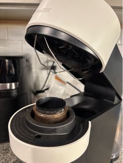 Nespresso Vertuo + pod holder + descaling solution