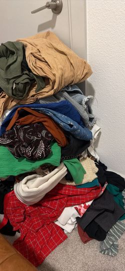 A full bag of clothes like new