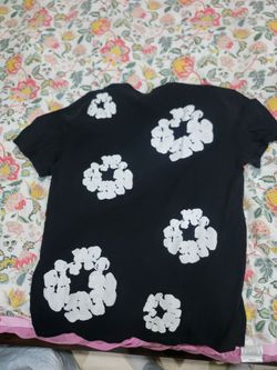 Denim tear t shirt worn a couple of times but in good condition