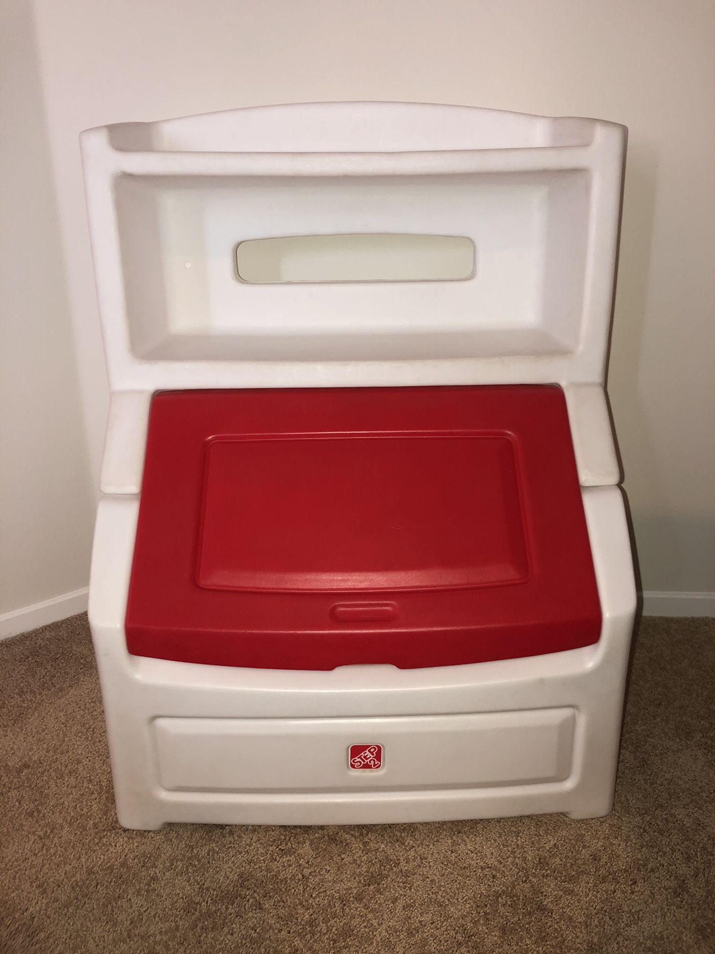 Gently Used Toy Box. Red & White Step2 Lift & Hide 38" Bookcase with Kids Storage Bin and Toy Organizer. 38"H x 28.5"W x 21"D. Holds books up to 10"
