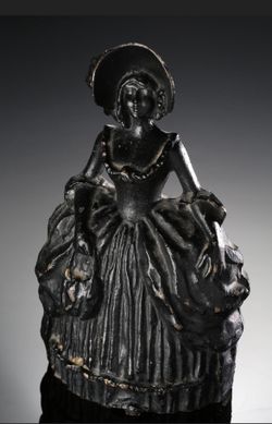 Unique Cast Iron Lady Door Stop 