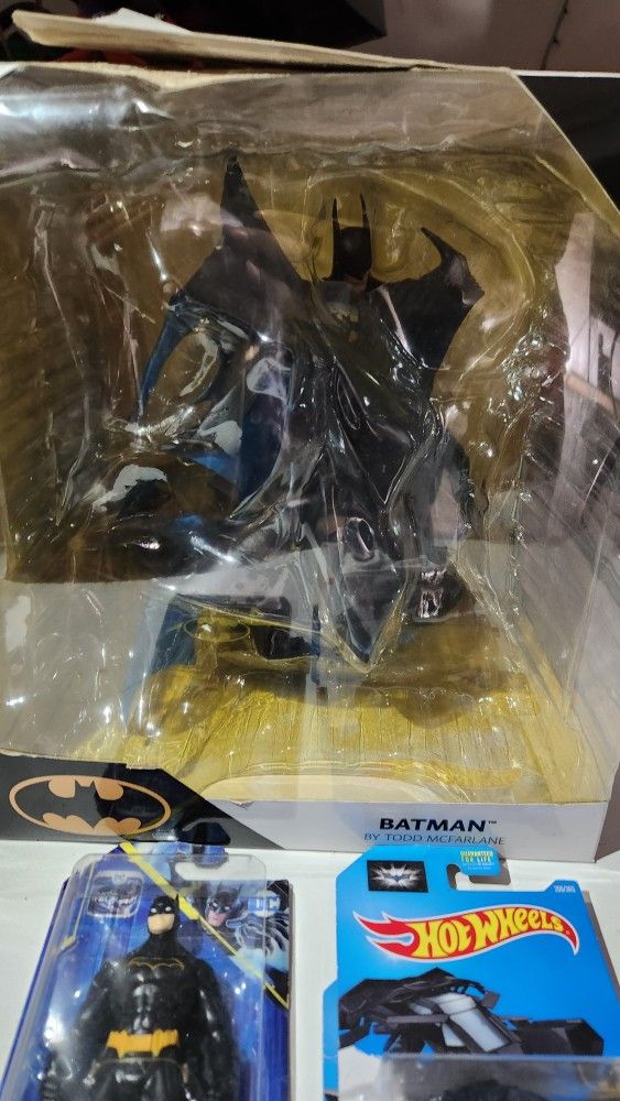 Batman Statue And Cars