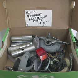Box of Skateboard and Rollerblade Parts