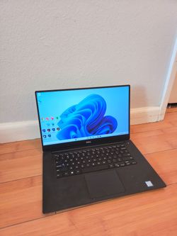 Dell Precision 15 inch i7 16gb ram 256gb, charger and ms office and adobe and or best offer