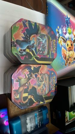 Pokemon charizard tins