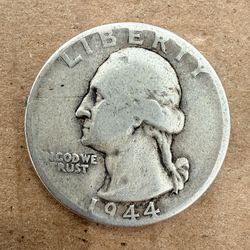 1944 No Mint Washington Quarter is a rare and valuable US coin composed of 90% silver. This 25 cent Quarter Dollar was struck in a business setting wi