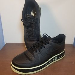 Nike Air Force 1 Black Leather Low Black Volt Sneaker 

