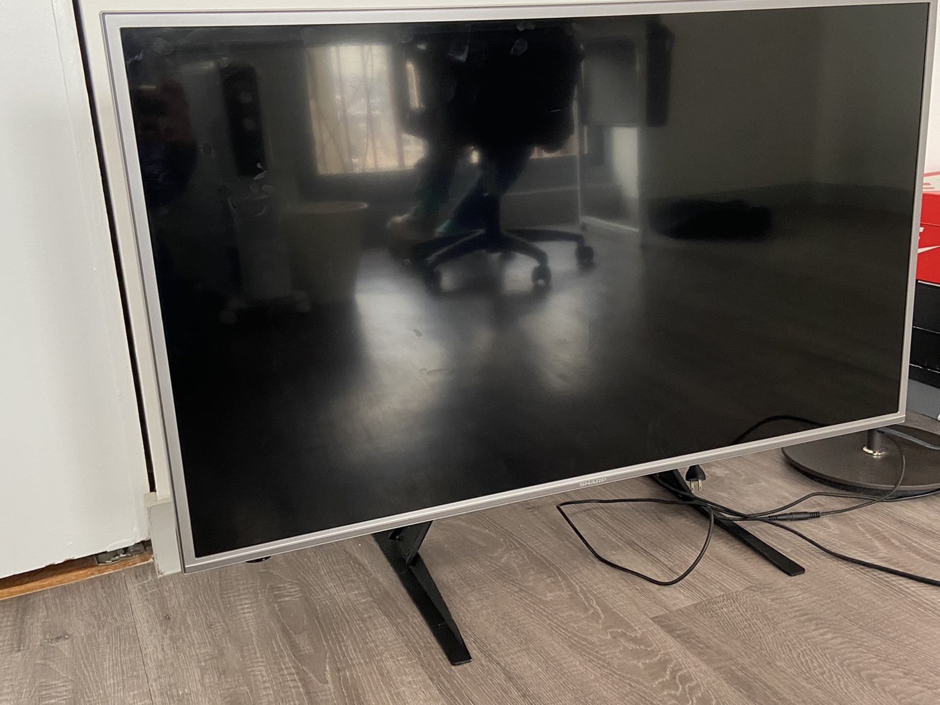 40” Sharp TV+ TV Stand + Remote