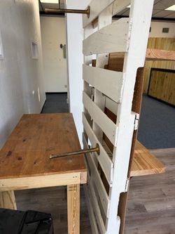 White rolling boutique shelf wall