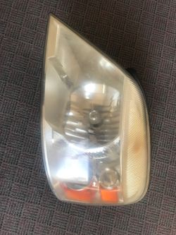 Ford Freestar left side headlight 2004 to 2007 OEM