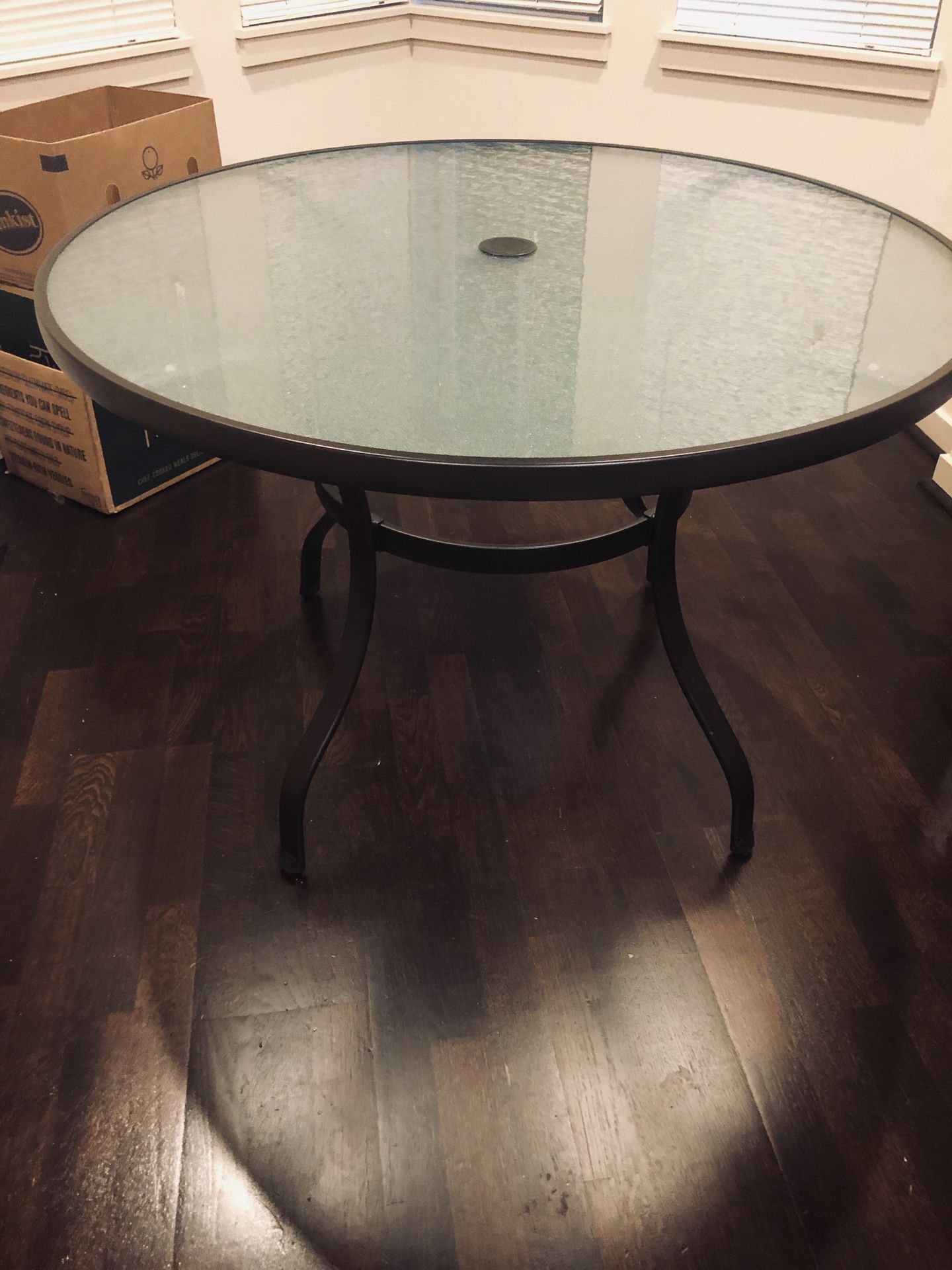 42”Round tempered glass, dark brown metal frame table.