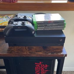 1 TB Xbox One X Bundle- 2 Controllers, 4 Games 