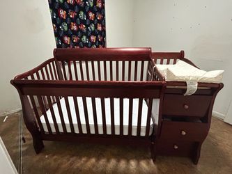 Crib with changing table