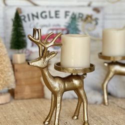 Gold reindeer pillar candle holder / 8” tall / $18
