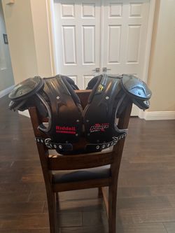 Riddell QB/WR shoulder pads size Small with the attached back plate