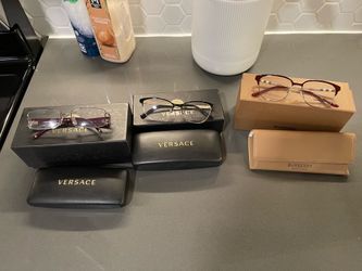 Women’s Versaces glasses for sale & a Burberry 150 each