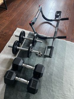 $50 for 2 sets of dumb bells and 1 pull up bar